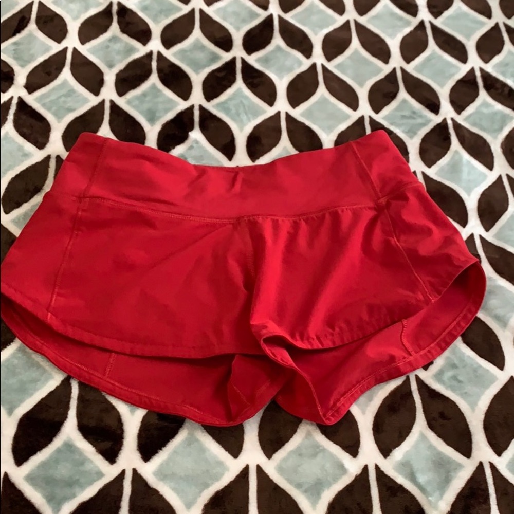 Red Lululemon shorts
